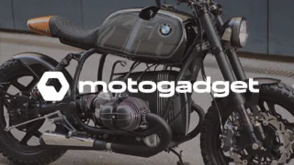 A motorcycle stands on a road – symbolizing Motogadget’s e-commerce relaunch powered by Shopify Plus as the engine for scalability and growth.